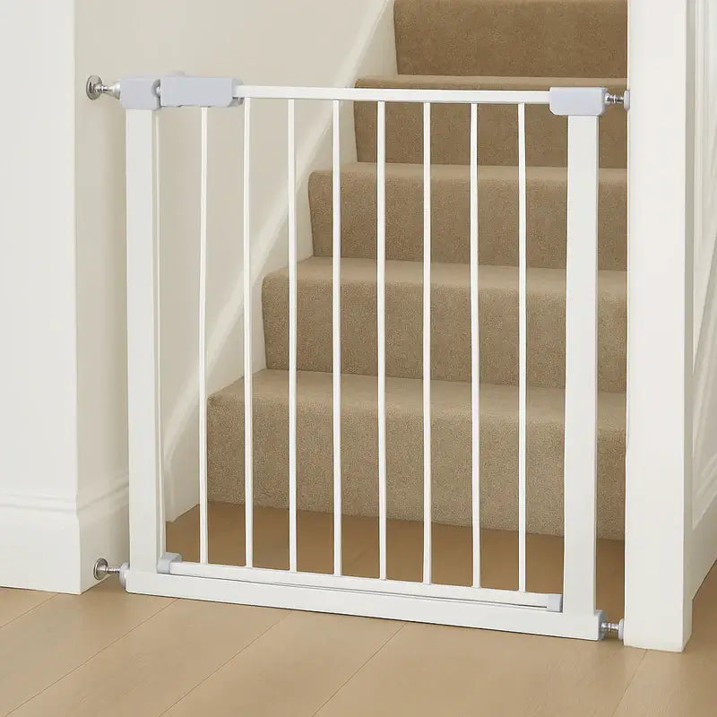 White metal gate installed on a staircase to prevent pets from accessing stairs.