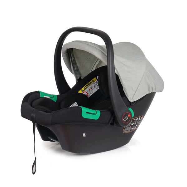Sage infant car seat with black shell, grey canopy, and green handle accents