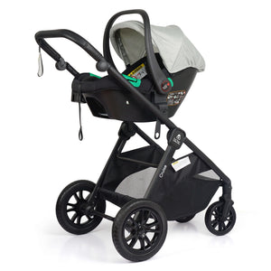 Sage travel system stroller with attached infant car seat, grey canopy and green accents