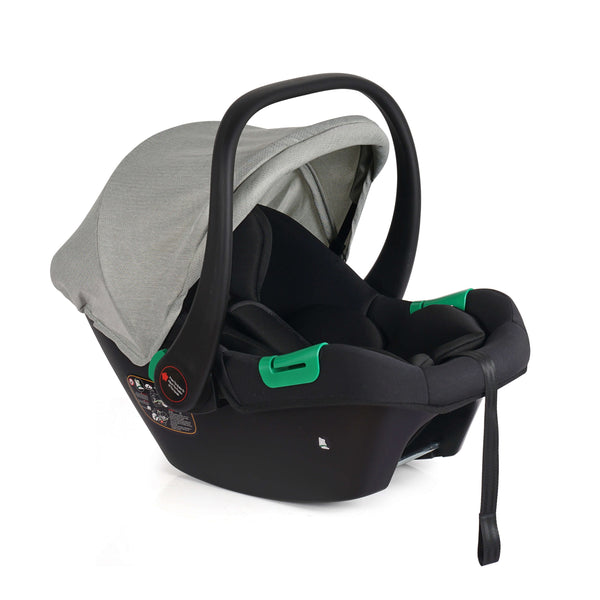 Sage infant car seat with grey canopy and green latch accents, angled view