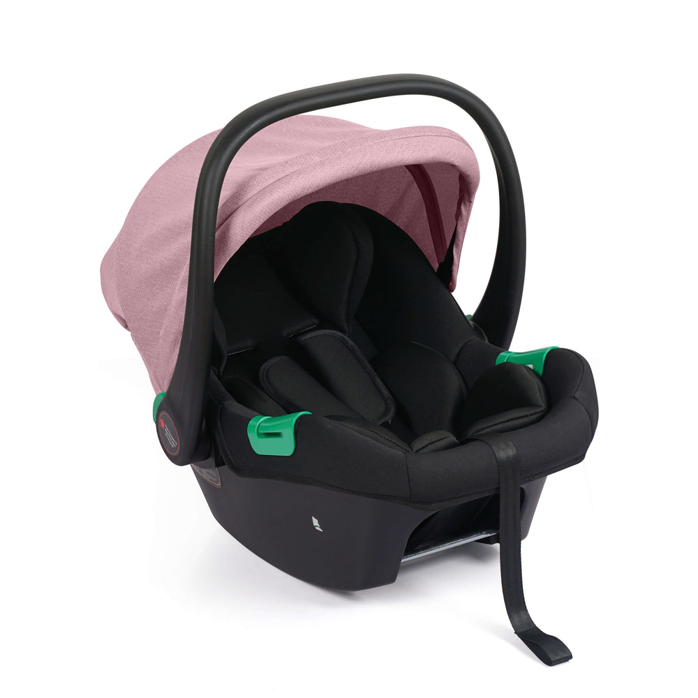 Blush rose canopy infant car seat on black base with green handle accents