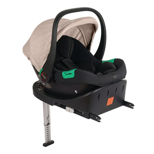 Black infant car seat on adjustable ISOFIX base with beige canopy