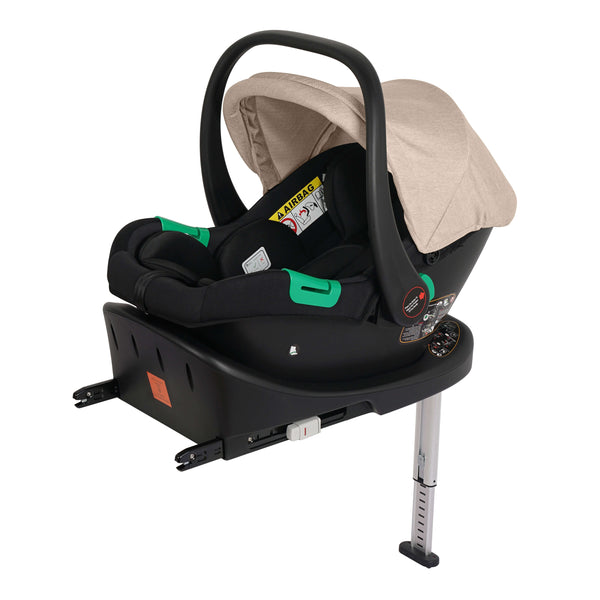 Black infant car seat with beige canopy and visible ISOFIX base connectors
