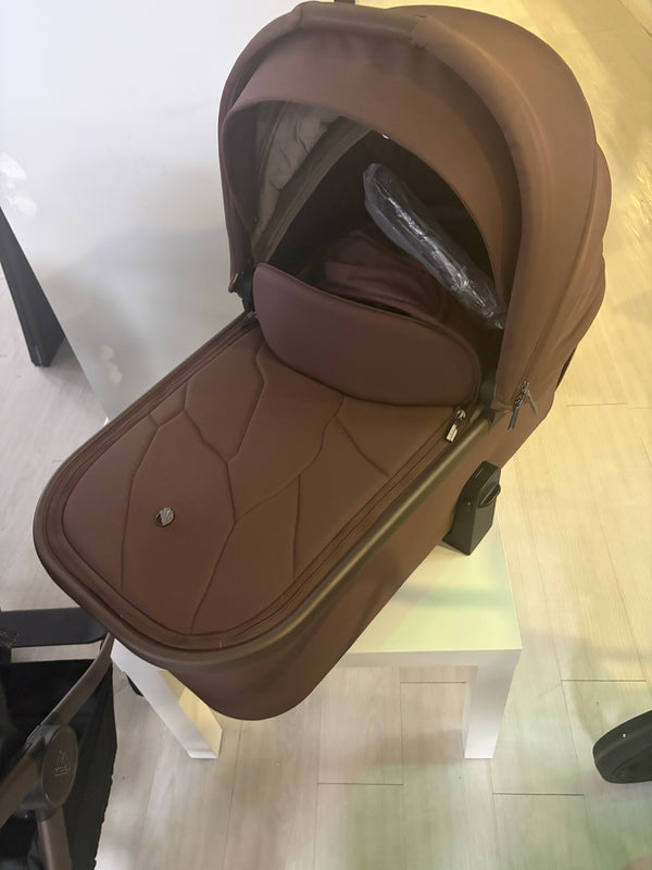 Burgundy carrycot with quilted base and canopy, stroller frame with wheels