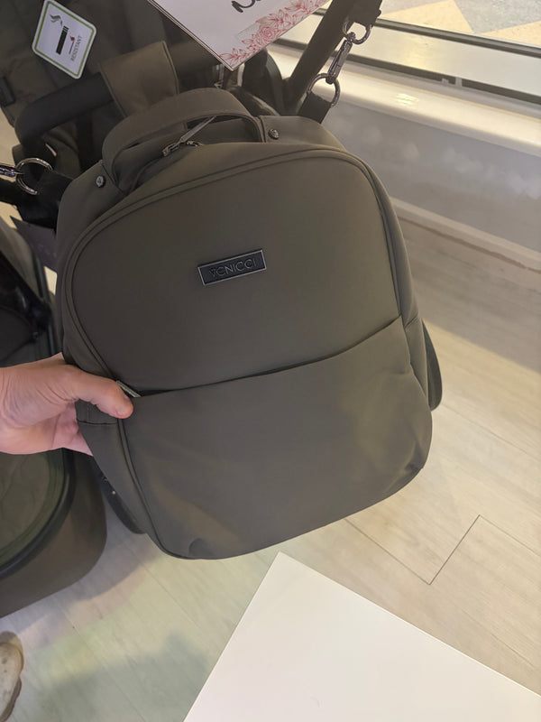 Moss stroller carrycot with logo patch, close side view