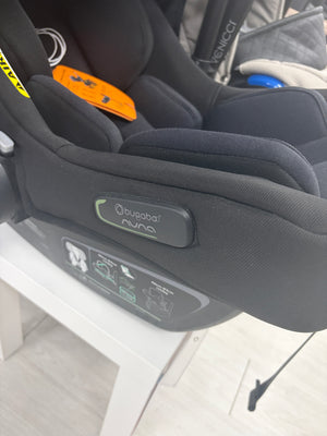 Black baby car seat with Bugaboo NUNA label on side panel and recline buttons