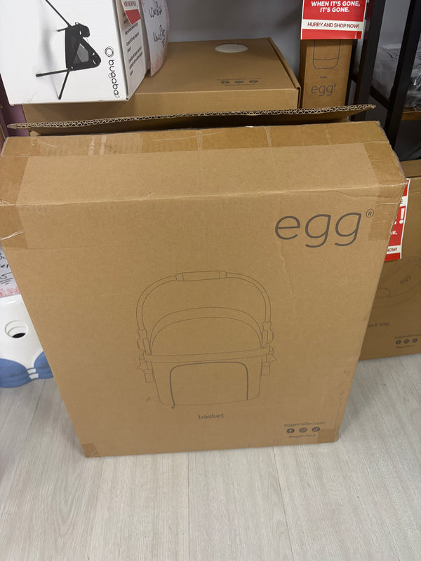 Egg brand pet stroller basket shipping box with line-drawing on brown carton