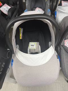 Cream newborn car seat with padded hood and open interior