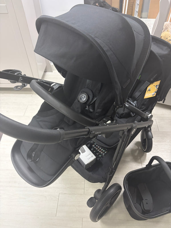 Cybex Gazelle double stroller, side view of two black seat units