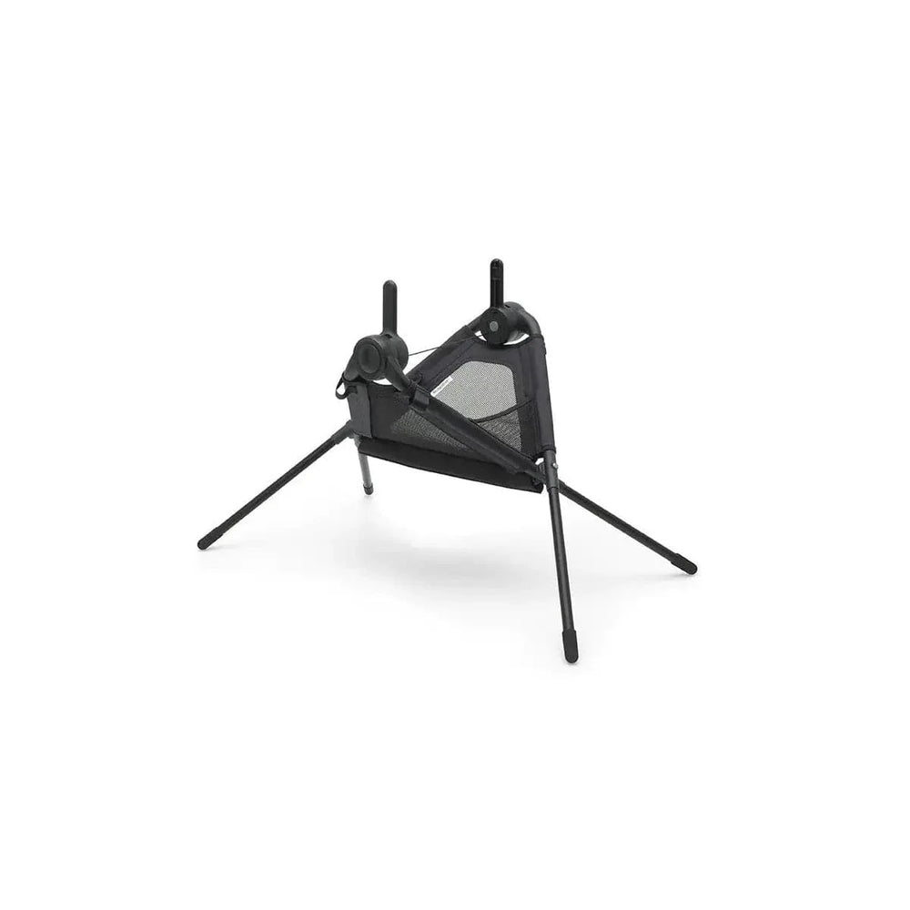 Black stroller carrycot stand with tripod legs and adjustable support frame