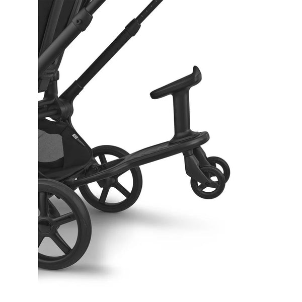 Bugaboo wheeled board attached to a stroller, with the seat angled upward