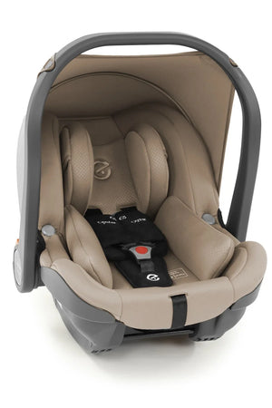 Beige baby capsule car seat with gray shell, headrest padding and harness