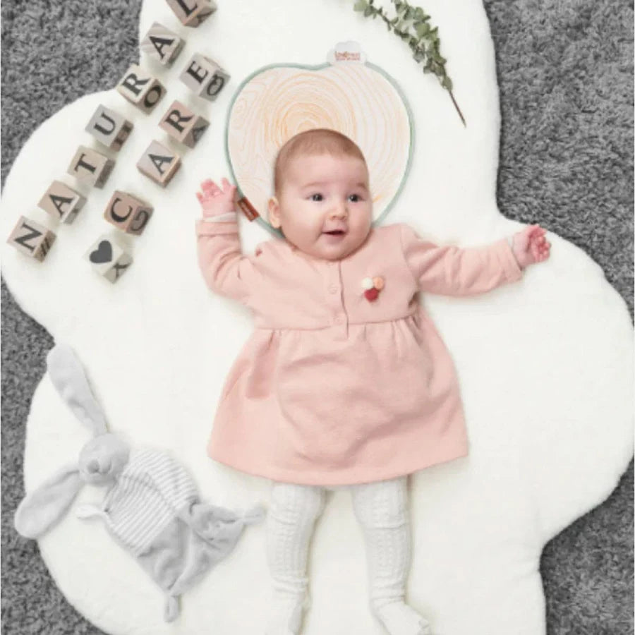 Babymoov Lovenest Natural Care baby head support with orange contour print and central opening
