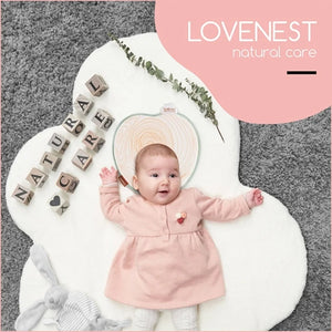 Babymoov Lovenest Natural Care support positioned beneath a baby's head